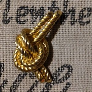 Antique brooch does have some lettering on it I think it says Avon and then as o